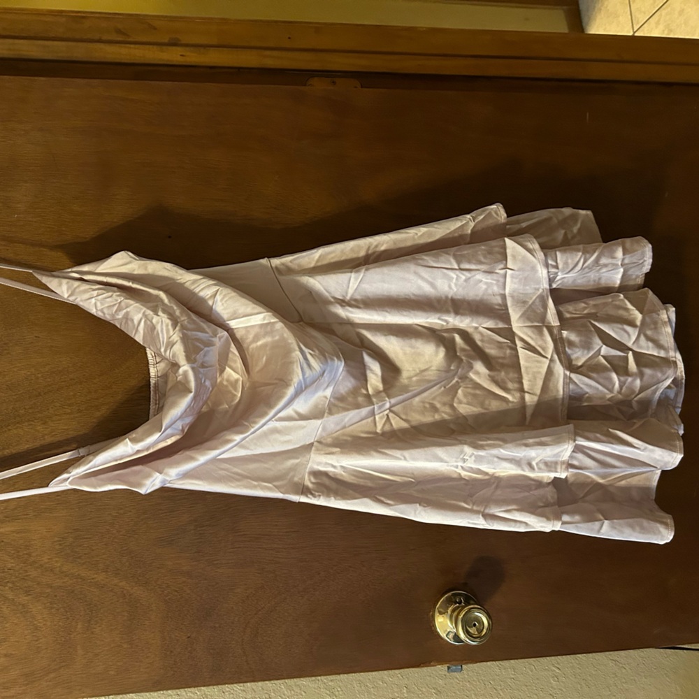 Satin cream colored dress with cross-cross spaghetti straps